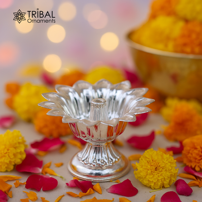 Fine 999 silver flower-shaped oil lamp by Tribal Ornaments, decorative silver diya for temple and home decor.