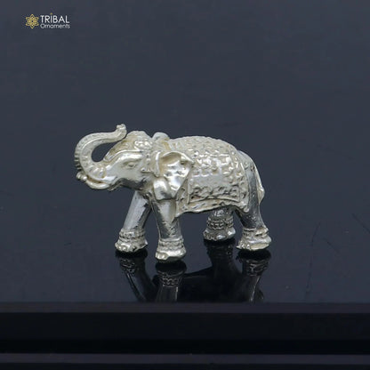 Solid 925 sterling silver elephant statue sculpture, detailed figurine representing wealth and prosperity, ideal for gifting or puja offerings.