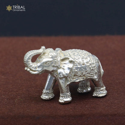 Solid 925 sterling silver elephant figurine sculpture by TRIBAL ORNAMENTS, detailed decorative gift or puja article for wealth and prosperity.