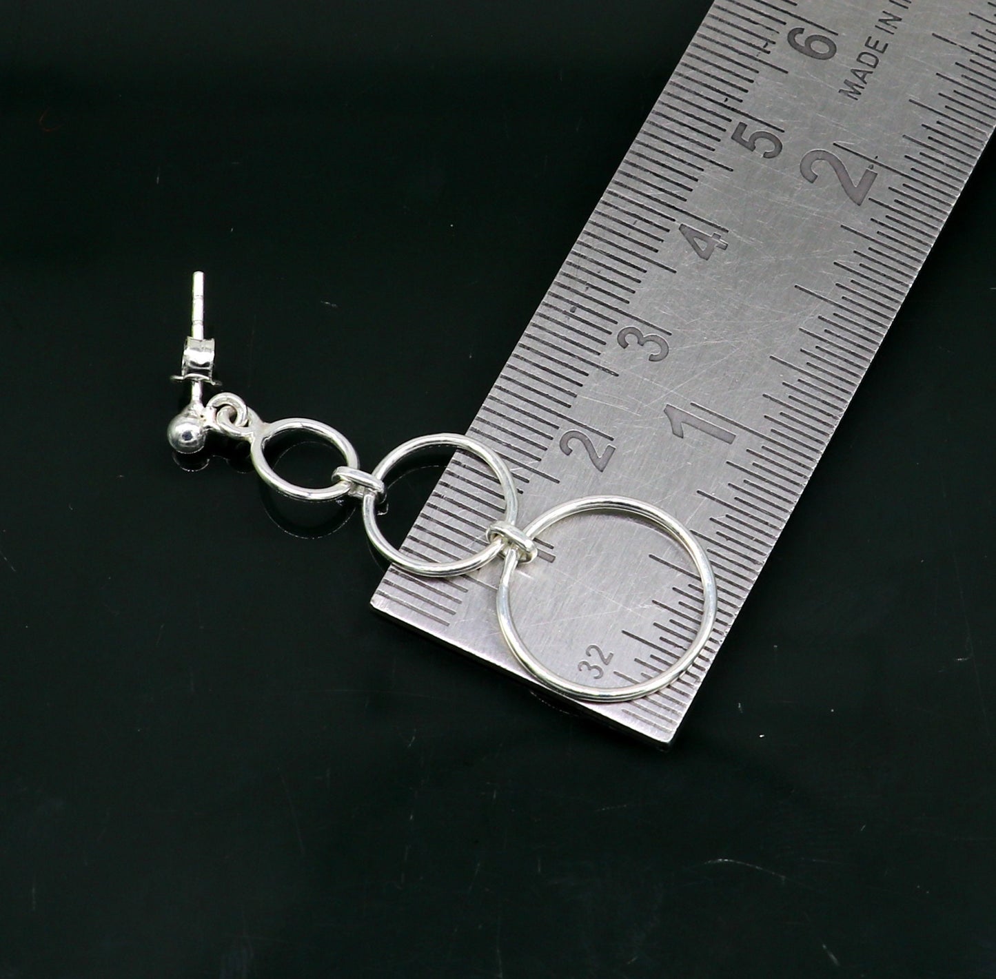 Sterling silver dainty stud earring with three circle design, geometric drop dangle style, by TRIBAL ORNAMENTS.