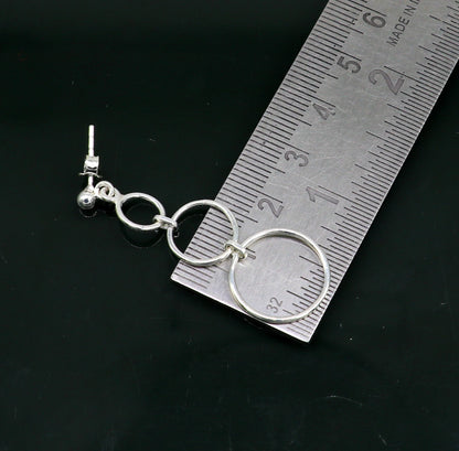 Sterling silver dainty stud earring with three circle design, geometric drop dangle style, by TRIBAL ORNAMENTS.