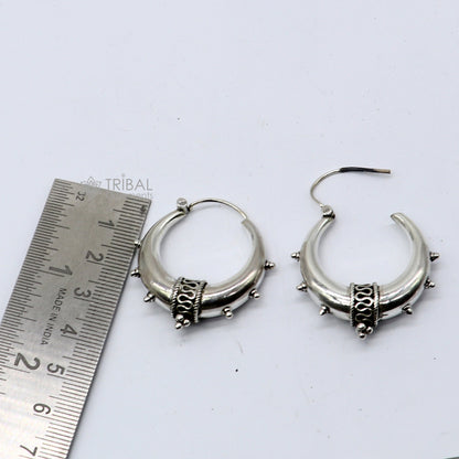 Handmade 925 sterling silver hoop earrings with a plain, shiny finish, Bali-inspired tribal design, unisex style, perfect for belly dance jewelry.