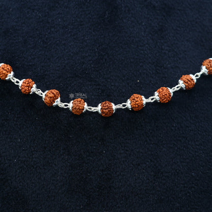 Handmade 925 sterling silver necklace with natural Rudraksh beads, 24 inches long, crafted by TRIBAL ORNAMENTS.