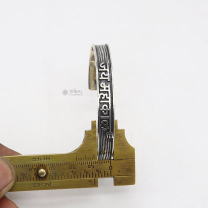 Sterling silver Lord "JAI MAHAKAAL" mantra adjustable cuff bracelet for men and women, featuring handmade tribal design.