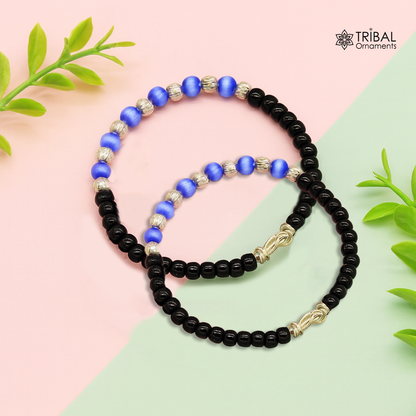 Handmade black beads baby evil eye bracelet by TRIBAL ORNAMENTS, customized unisex newborn gift baby bangle with nazariya design.