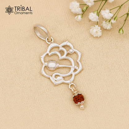 Sterling silver Aum mantra Rudraksha pendant, handcrafted vintage designer jewelry from Tribal Ornaments, featuring intricate details.