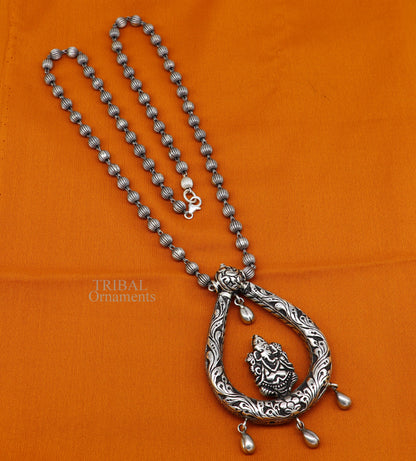 Indian tribal-style silver Ganesha pendant with beaded necklace, traditional ethnic jewelry set in 925 sterling silver.