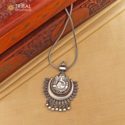 Sterling silver Lord Ganesha pendant with hanging bells, tribal jewelry necklace by Tribal Ornaments, detailed tribal design.