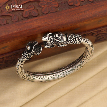 Sterling silver Lord Shiva lingam with Nandi Maharaj design on a handmade bangle bracelet by TRIBAL ORNAMENTS.