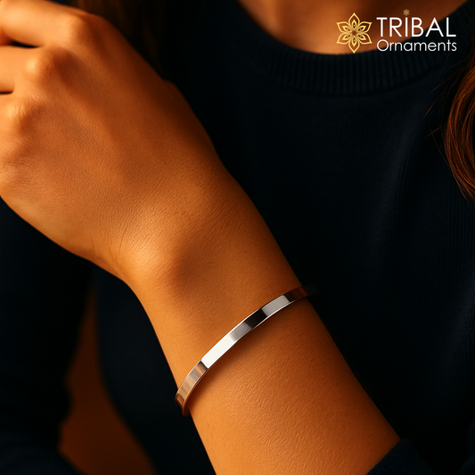 Obliq style shiny 925 sterling silver men's bangle cuff bracelet with a plain design, crafted by TRIBAL ORNAMENTS.