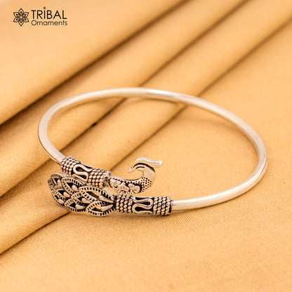Peacock style 925 sterling silver bangle bracelet by TRIBAL ORNAMENTS, easy to wear silver kada jewelry with intricate design.