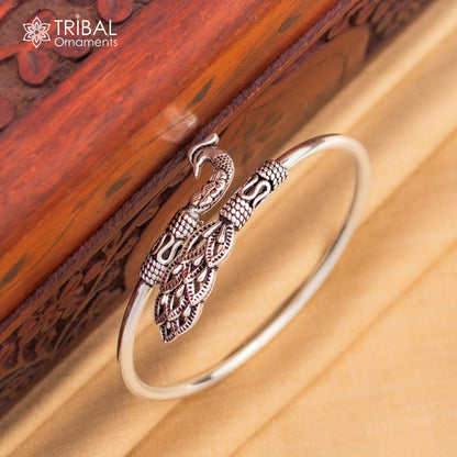 Peacock style 925 sterling silver bangle bracelet by TRIBAL ORNAMENTS, featuring intricate design and easy slip-on fit.