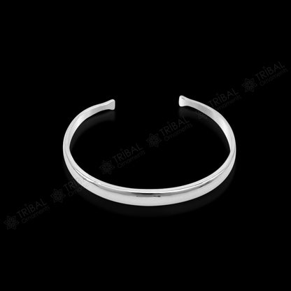 Shiny solid 925 sterling silver adjustable cuff bangle bracelet by Tribal Ornaments, unisex jewelry with a sleek, minimalist design