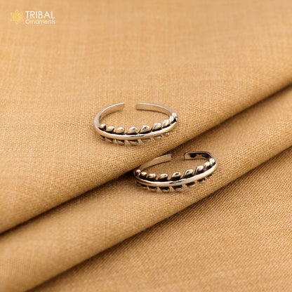 Handmade sterling silver small toe ring with customized tribal design, part of TRIBAL ORNAMENTS' bridal jewelry collection from India.