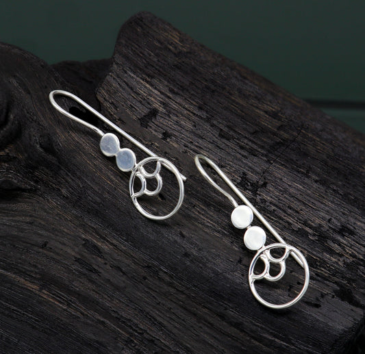 Sterling silver handmade circle hoop earring by TRIBAL ORNAMENTS, stamped 925, fashionable jewelry for girls or gifting.