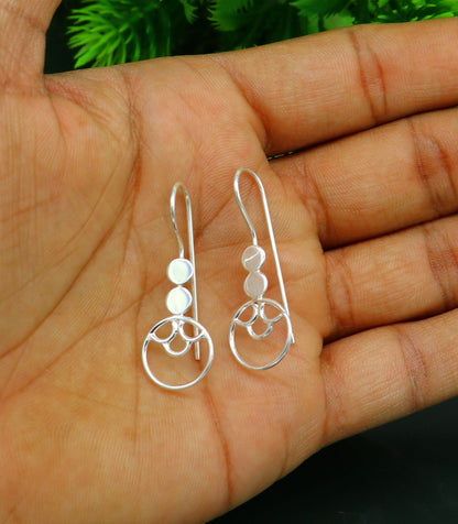 Sterling silver handmade circle hoop earring by TRIBAL ORNAMENTS, stamped 925, stylish jewelry for girls or gifting.
