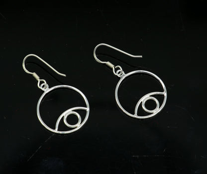 Sterling silver handmade circle hoop earring with drop dangle design, trendy and plain for girls and brides, by TRIBAL ORNAMENTS.