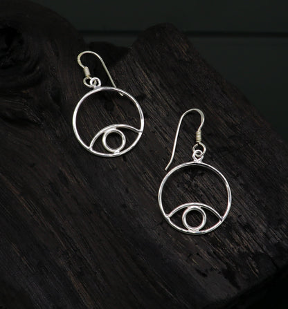Sterling silver handmade circle hoop earrings with drop dangle charm, trendy and plain design for girls and brides by TRIBAL ORNAMENTS.