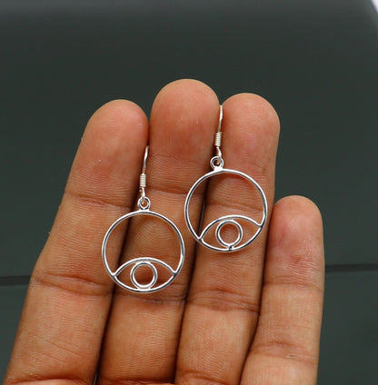 Sterling silver handmade circle hoop earring with drop dangle charm, stylish and trendy jewelry for girls and brides.