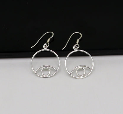 Sterling silver handmade circle hoop earring with drop dangle charm, stylish and trendy jewelry for girls and brides.