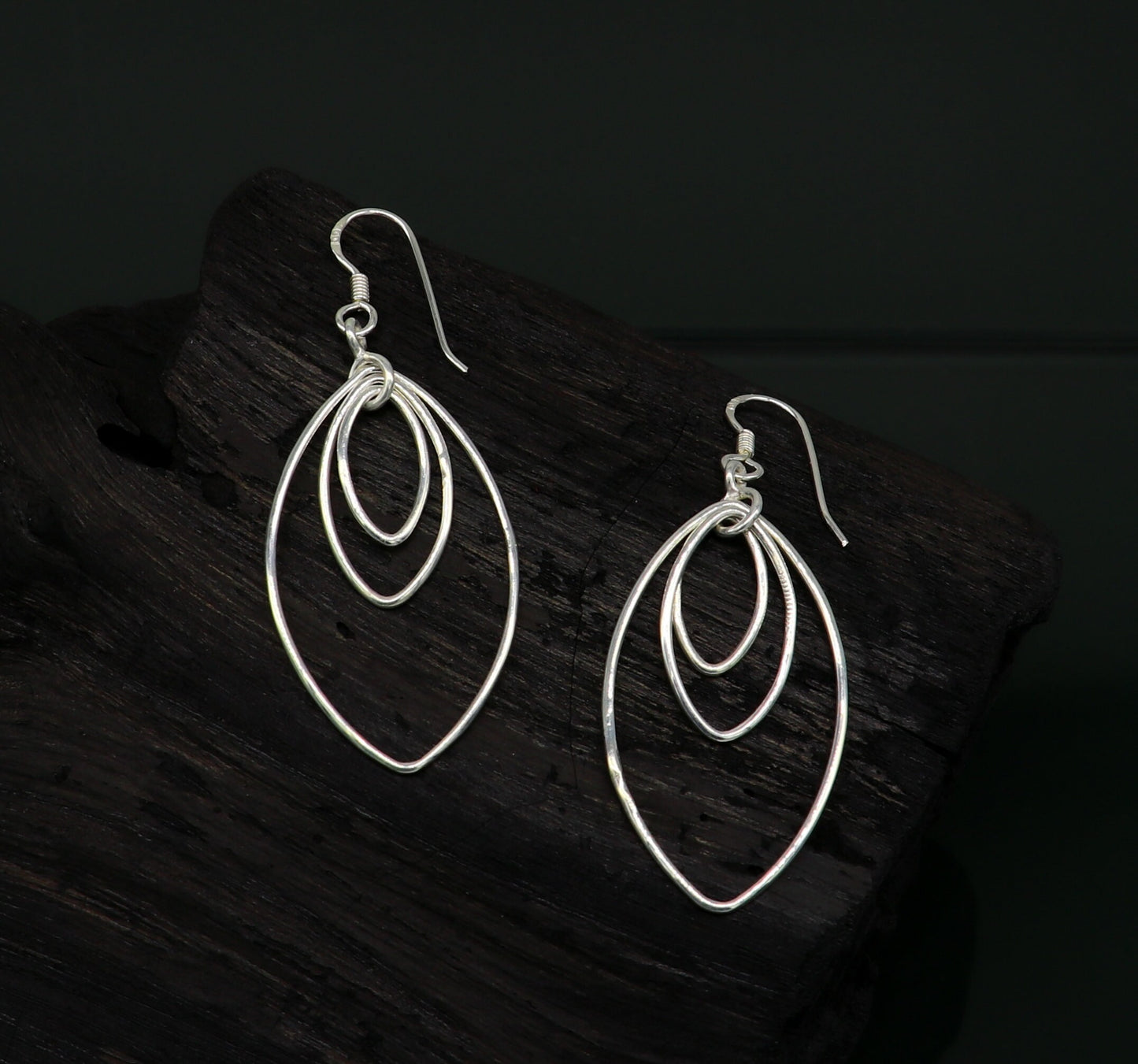 Sterling silver handmade eclipse style hoop earring with geometric drop dangle, elegant and trendy for her jewelry collection.