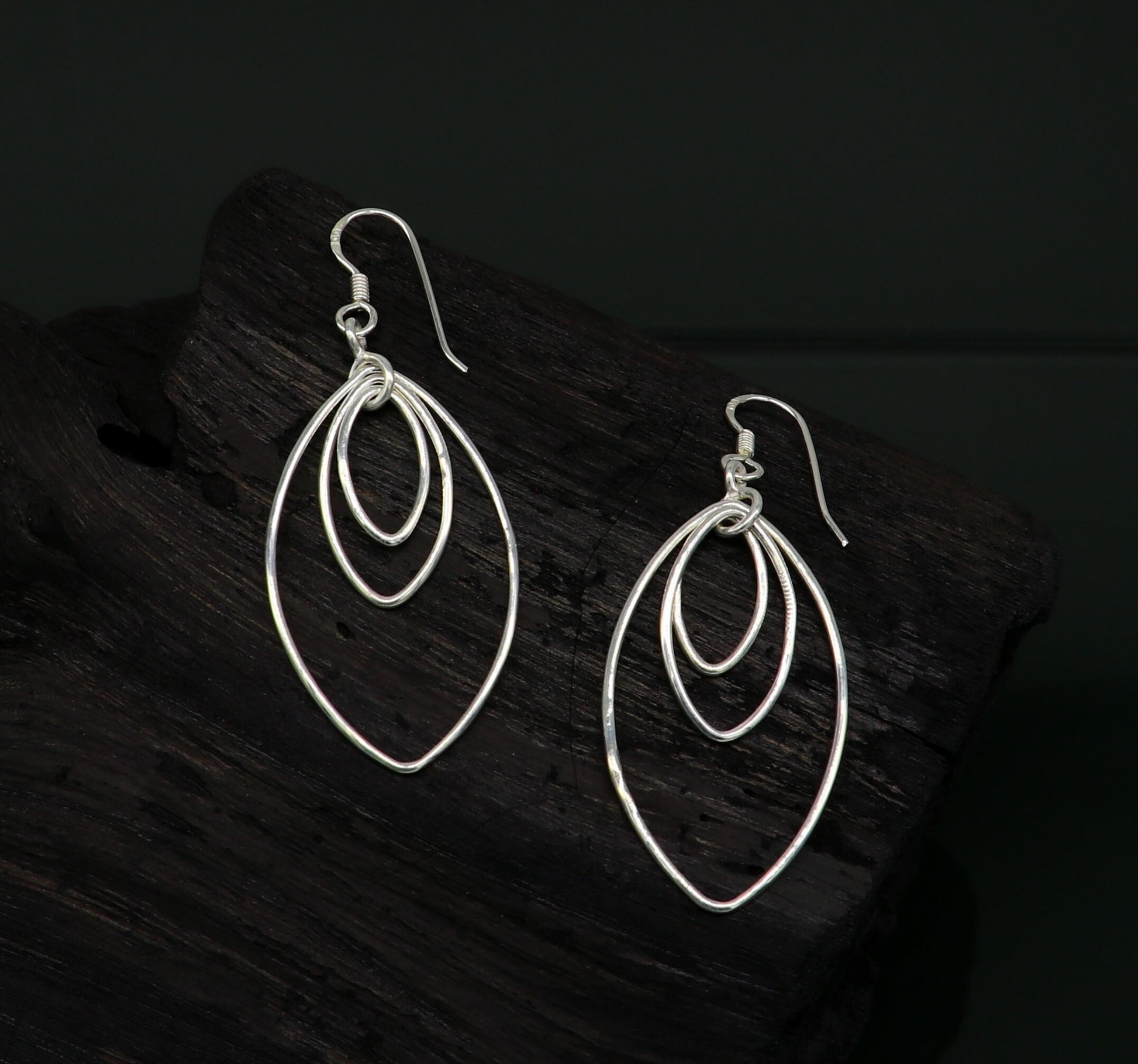 Sterling silver handmade eclipse style hoop earring with geometric drop dangle, elegant and trendy for her jewelry collection.