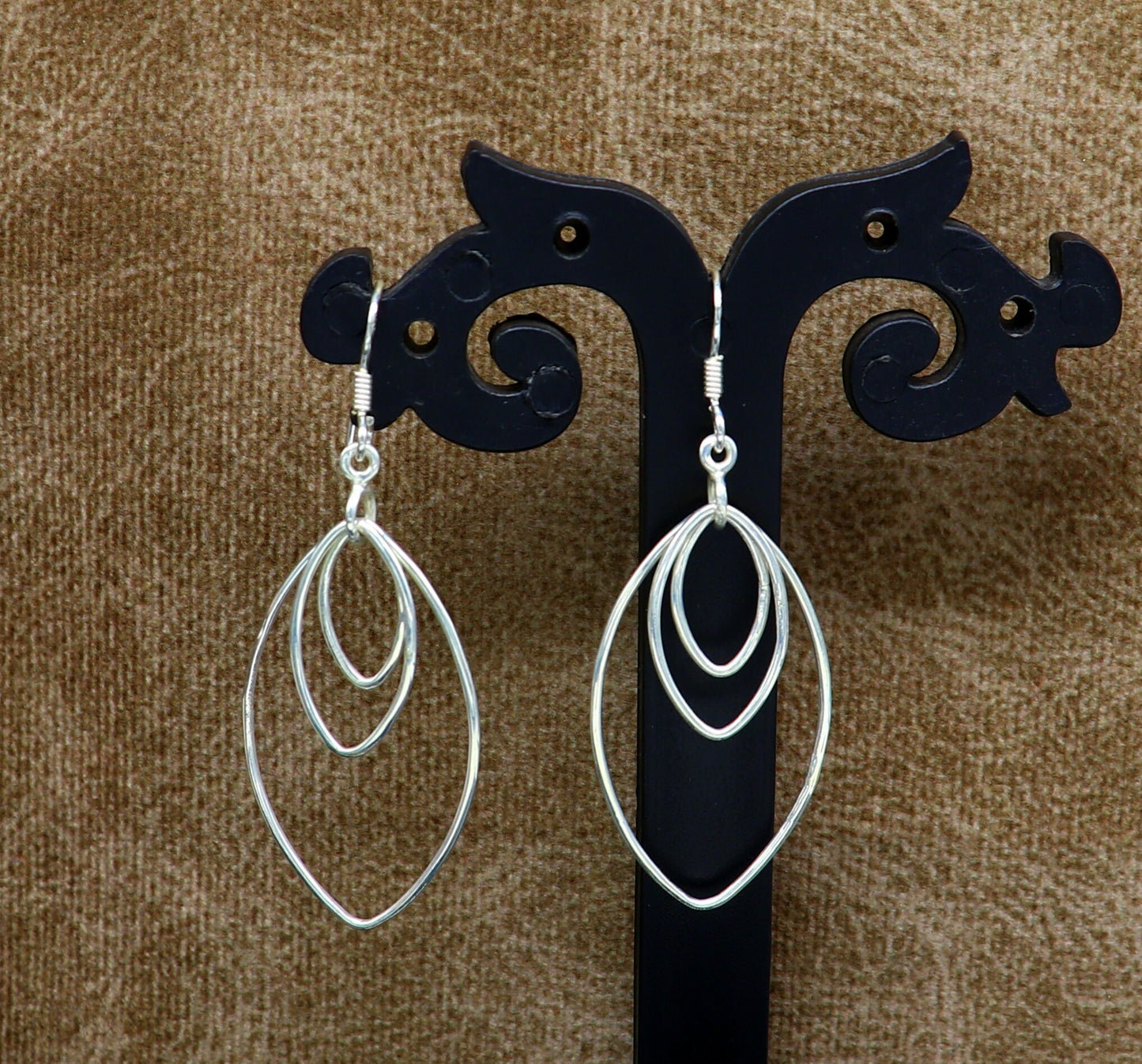 Sterling silver handmade eclipse-style hoop earring with geometric drop dangle, elegant and trendy jewelry by TRIBAL ORNAMENTS