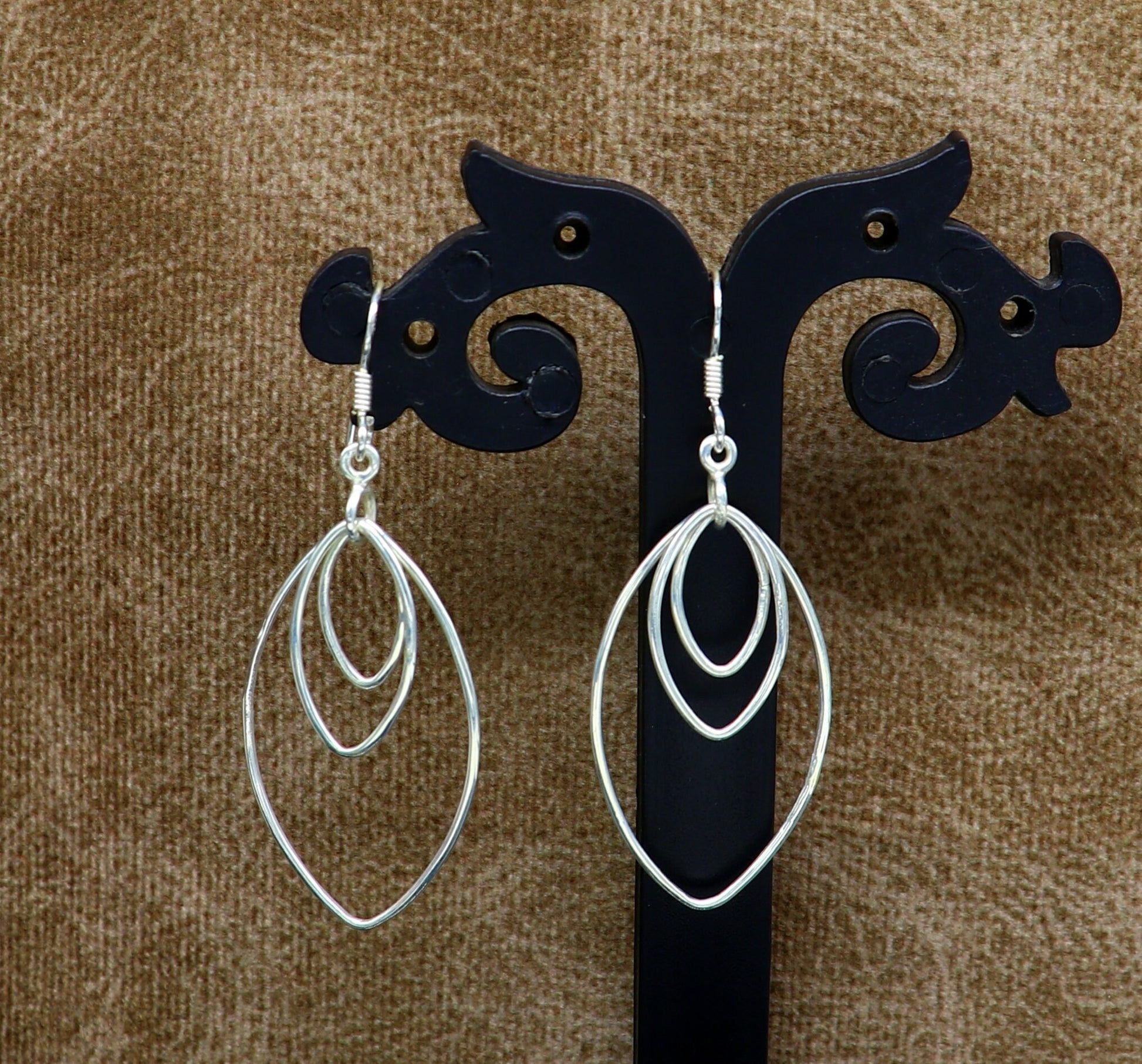 Sterling silver handmade eclipse-style hoop earring with geometric drop dangle, elegant and trendy jewelry by TRIBAL ORNAMENTS