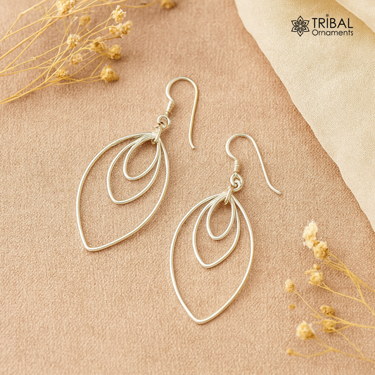 Sterling silver eclipse-style handmade hoop earrings with geometric drop design, elegant and trendy jewelry by TRIBAL ORNAMENTS.
