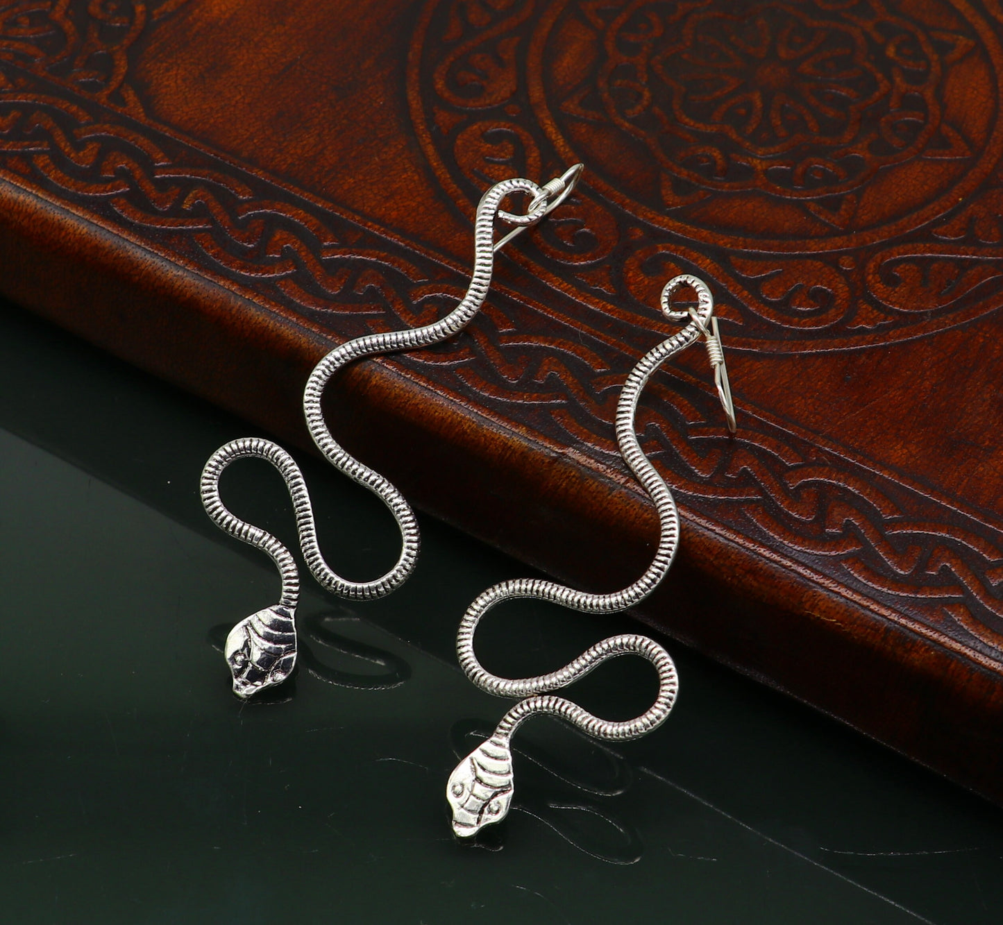 Sterling silver handmade snake design hoop earring by TRIBAL ORNAMENTS, vintage antique style for brides and stylish jewelry.