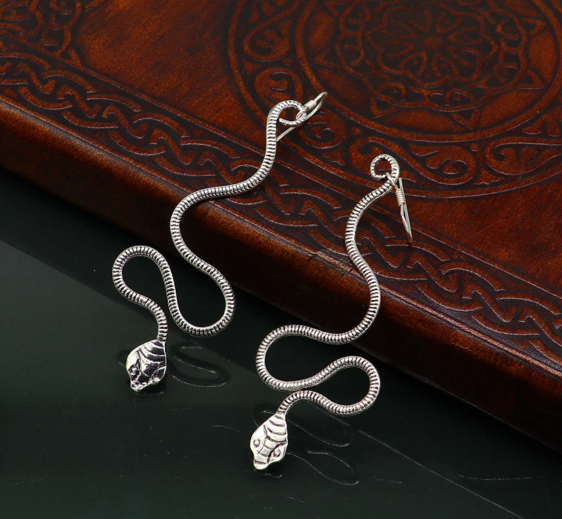 Sterling silver handmade snake design hoop earring by TRIBAL ORNAMENTS, vintage antique style for brides and stylish jewelry.