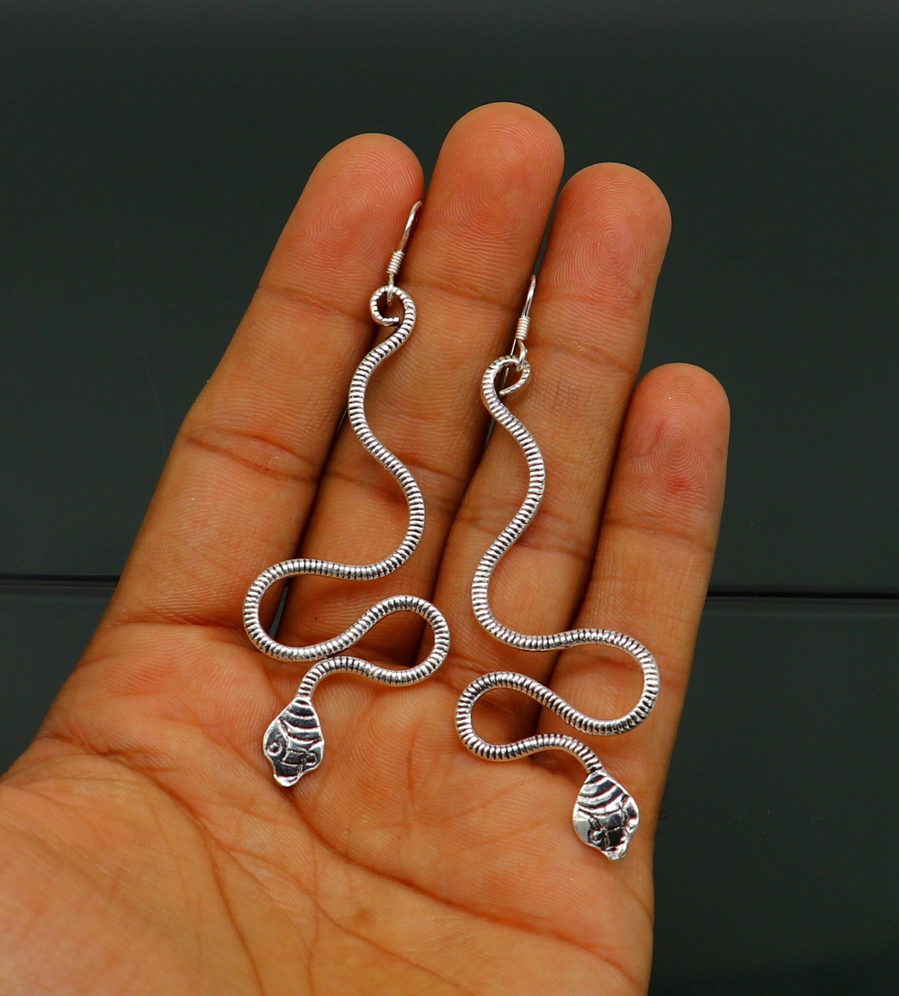 Sterling silver handmade snake design hoop earring by TRIBAL ORNAMENTS, vintage style, unique designer bridal jewelry.