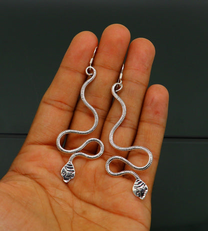 Sterling silver handmade snake design hoop earring by TRIBAL ORNAMENTS, vintage style, unique designer bridal jewelry.