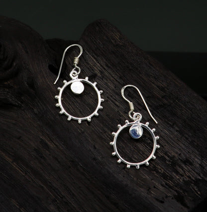 Sterling silver handmade hoop earring with dangle charm, trendy designer style for girls and brides, by TRIBAL ORNAMENTS.