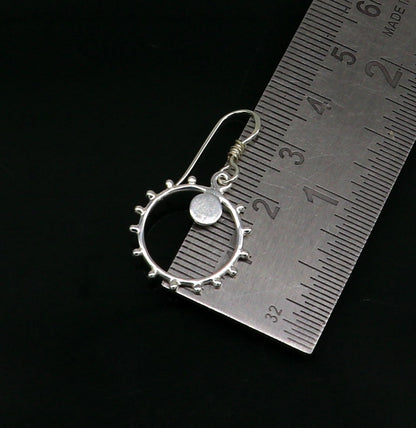 Sterling silver handmade trendy hoop earring with drop dangle charm, designed for girls and brides by TRIBAL ORNAMENTS.