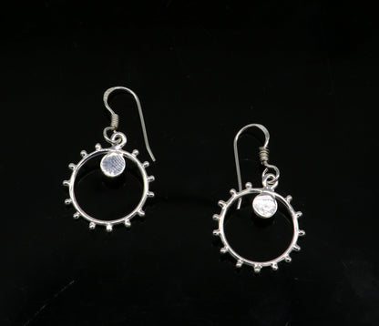 Sterling silver handmade designer hoop earrings with drop dangle charms, stylish jewelry for girls and brides.