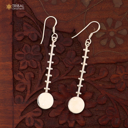 Sterling silver handmade hoop earrings by TRIBAL ORNAMENTS, stylish and fashionable jewelry for brides and special occasions.