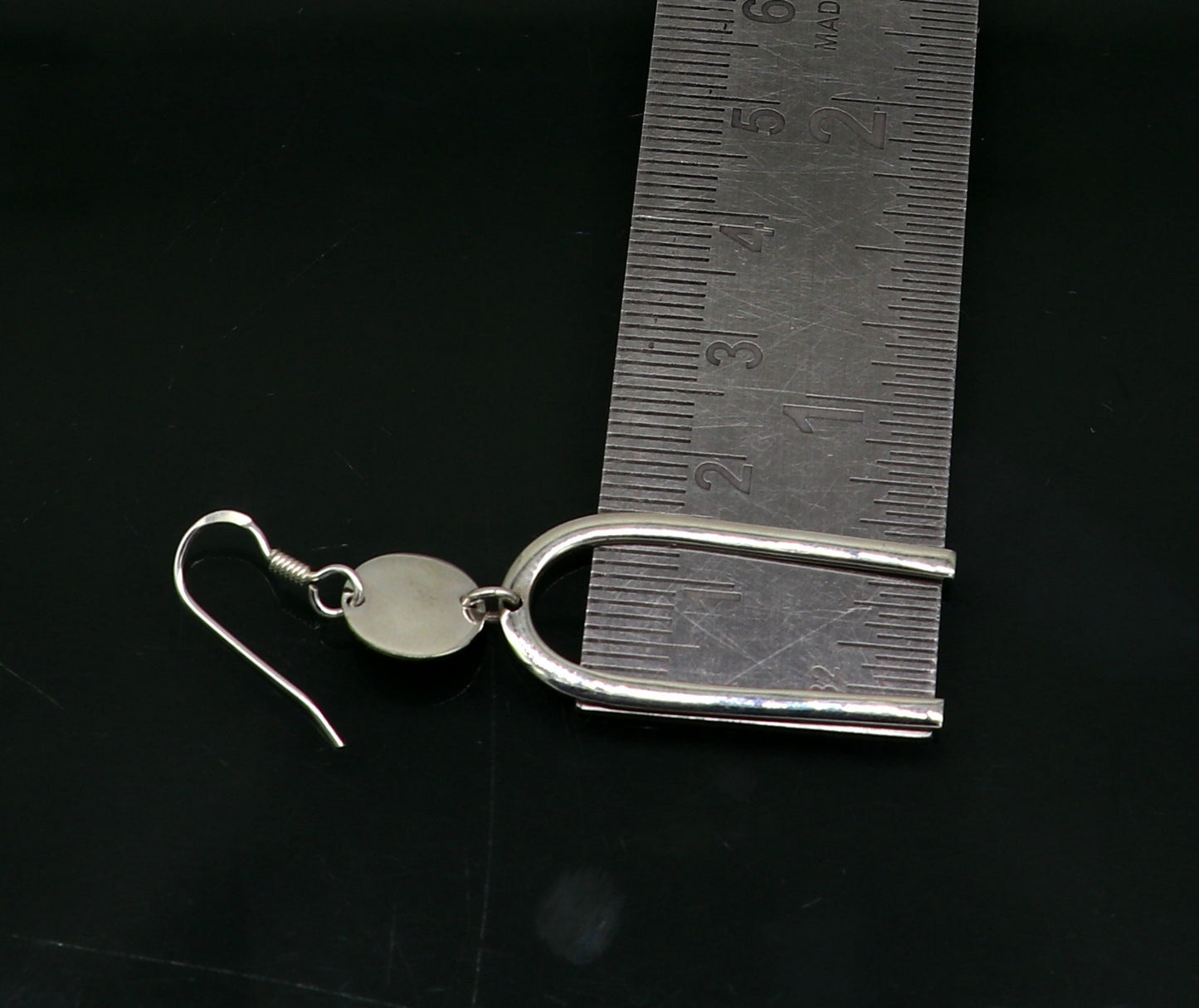 Sterling silver drop hoop earrings from TRIBAL ORNAMENTS, shiny plain dangle earrings for brides or gifting.