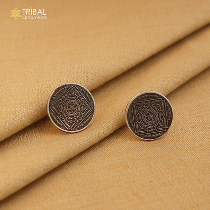 Round 925 sterling silver Mahamrityunjay Yantra stud earrings by TRIBAL ORNAMENTS, unisex jewelry with intricate yantra design.
