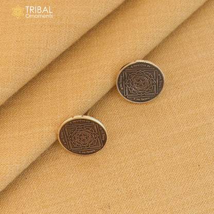 Round 925 sterling silver Mahamrityunjay Yantra stud earrings by TRIBAL ORNAMENTS, unisex jewelry with intricate yantra design.