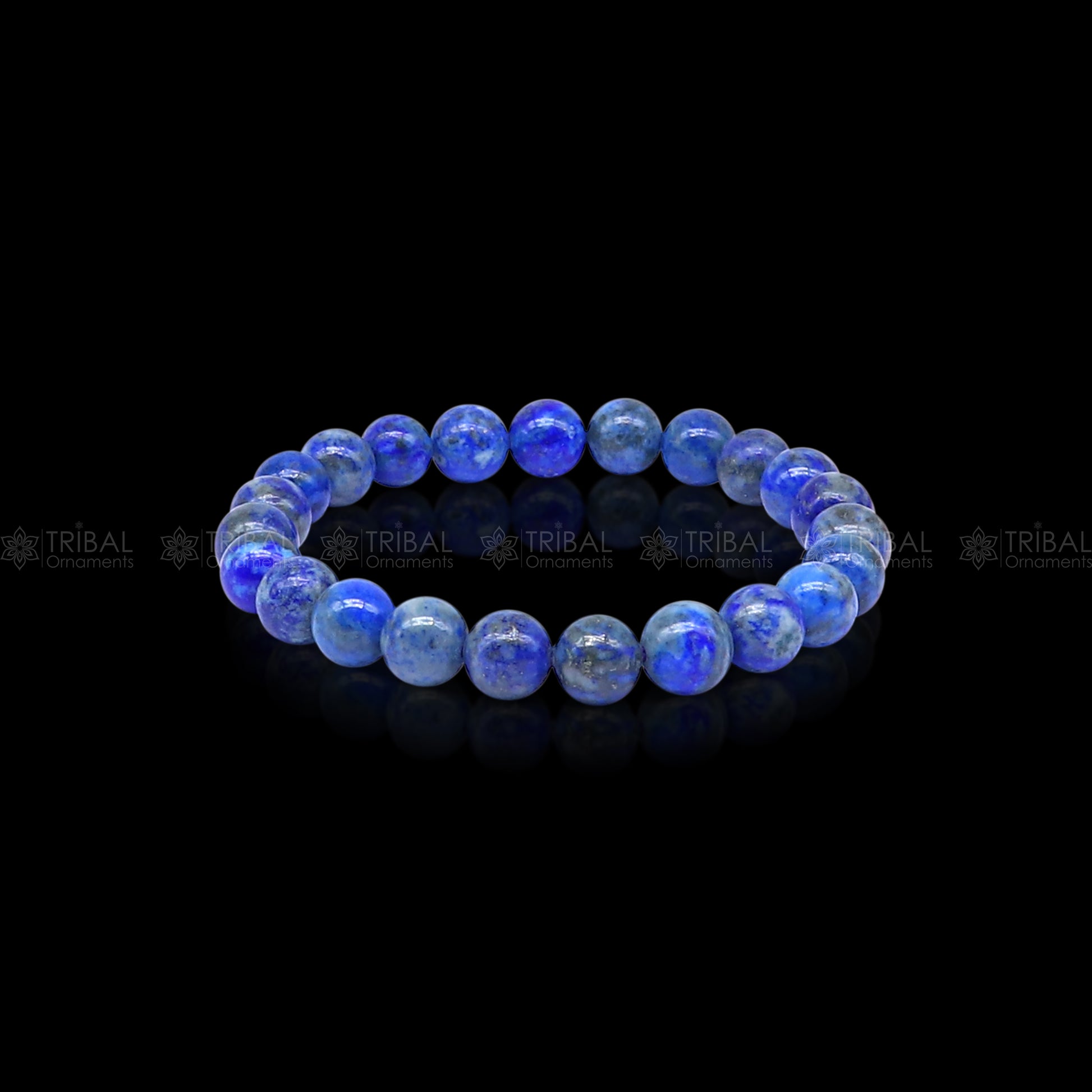 Blue sodalite crystal bracelet from TRIBAL ORNAMENTS, featuring calming and balancing energy with polished stone beads.