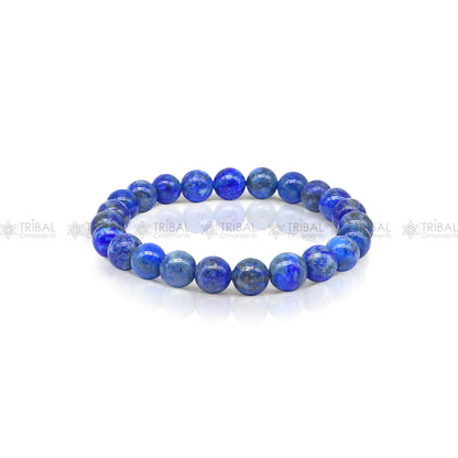 Sodalite crystal bracelet from TRIBAL ORNAMENTS featuring blue stones for calming and balancing energy.