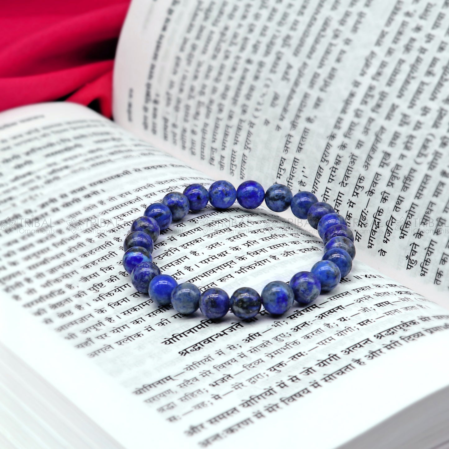 Sodalite crystal bracelet by TRIBAL ORNAMENTS featuring blue stones, designed to promote calming and balancing energy.