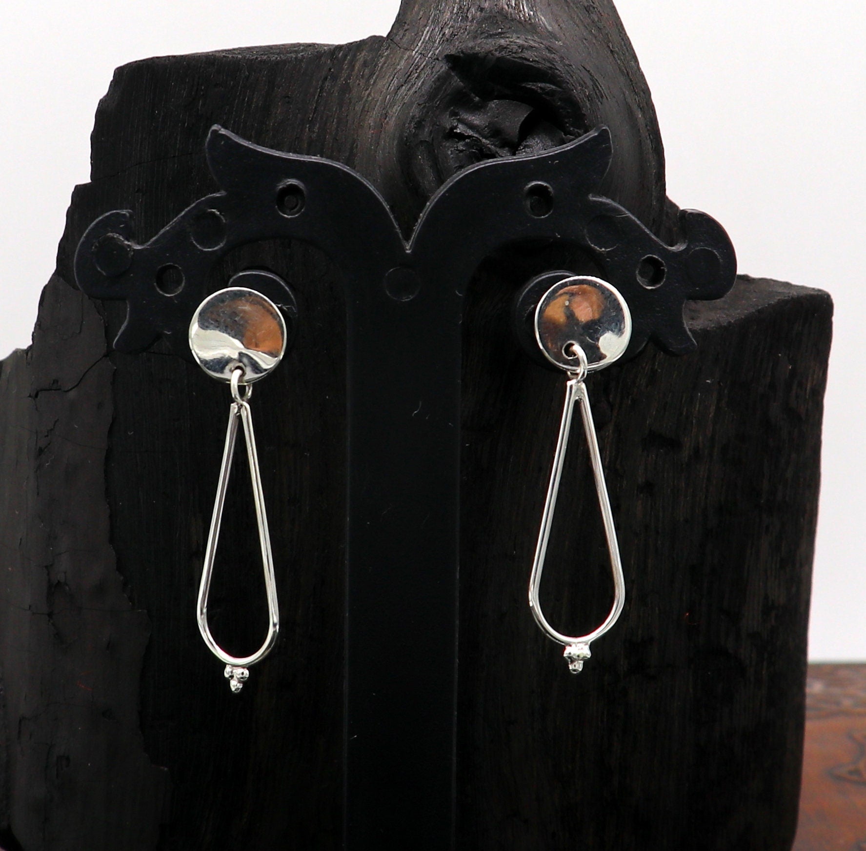 Sterling silver stud and dangle geometric earrings featuring customized unique designs, perfect for elegant ear jewelry.