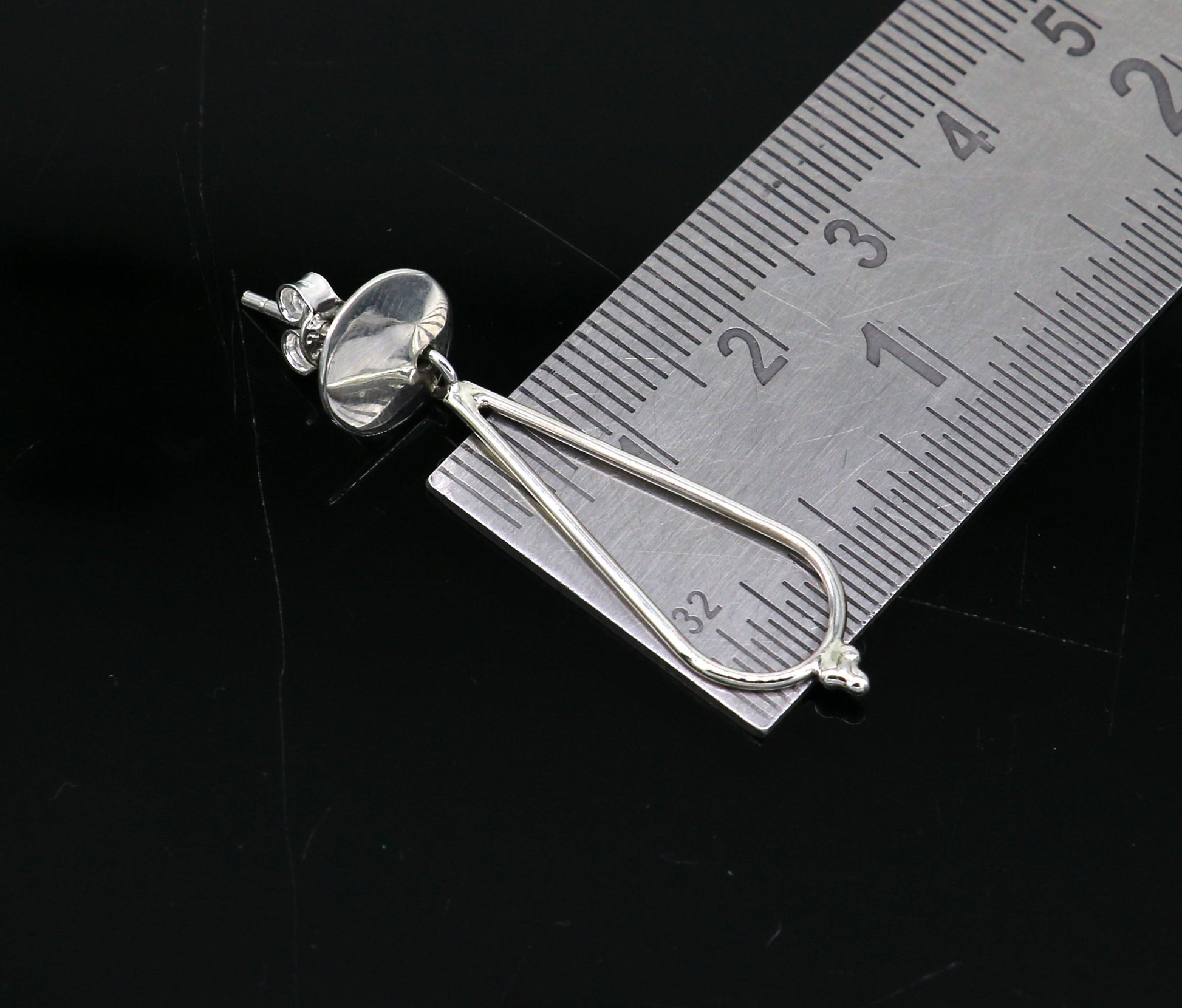 Sterling silver dainty stud and drop geometric earrings by TRIBAL ORNAMENTS, customized and unique design for elegant style.