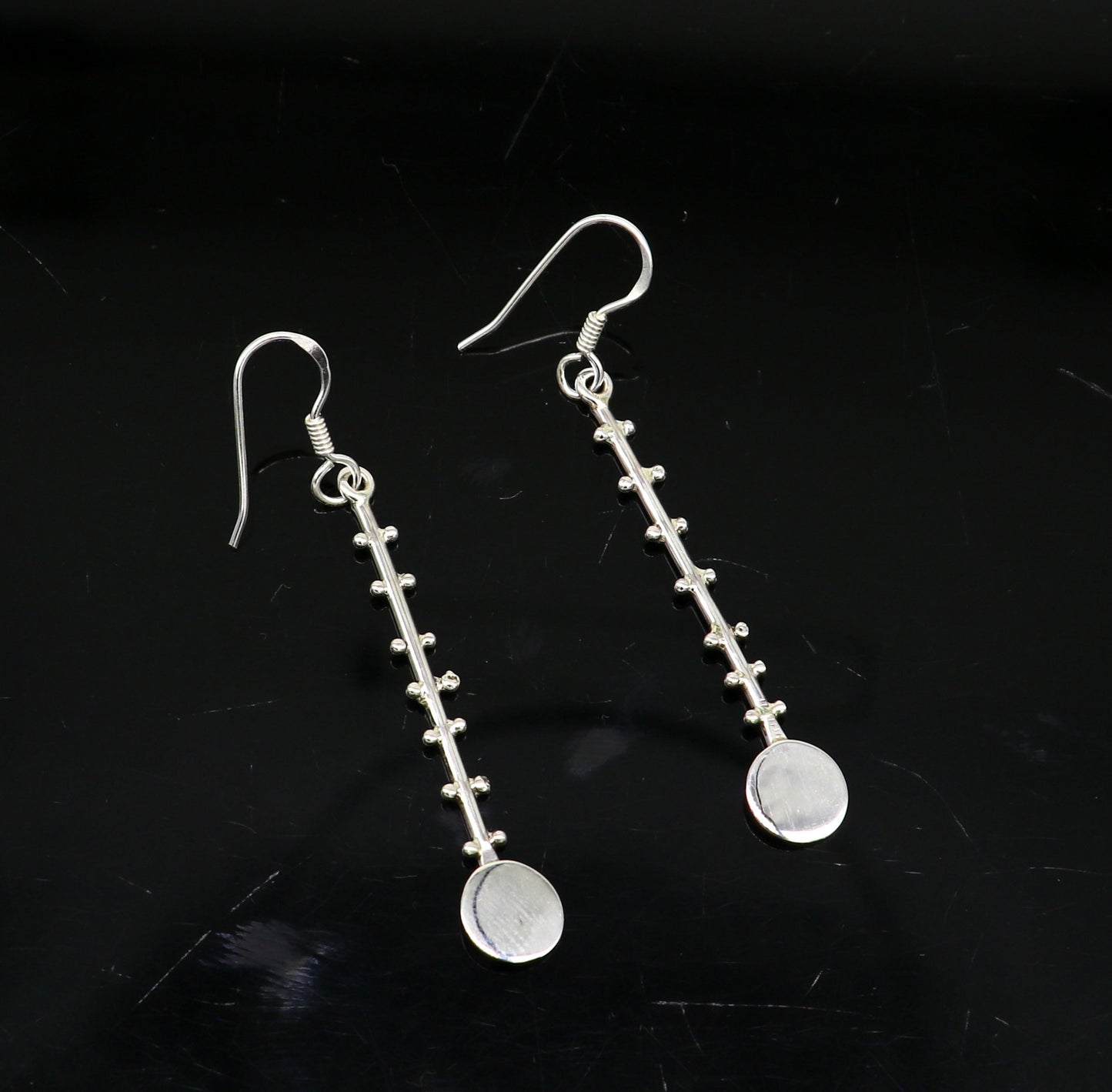 Solid 925 sterling silver handmade drop dangle hoop earring by TRIBAL ORNAMENTS, featuring stamped design for fashionable jewelry.