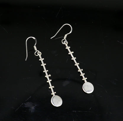 Solid 925 sterling silver handmade drop dangle hoop earring by TRIBAL ORNAMENTS, featuring stamped design for fashionable jewelry.
