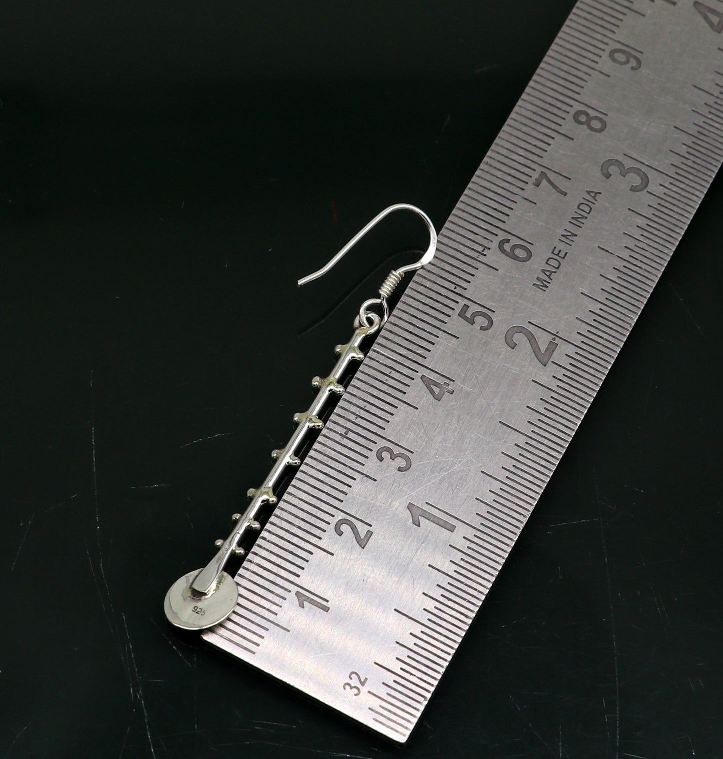Solid 925 sterling silver handmade drop dangle hoop earring by TRIBAL ORNAMENTS, featuring stamped design and fashionable jewelry style.