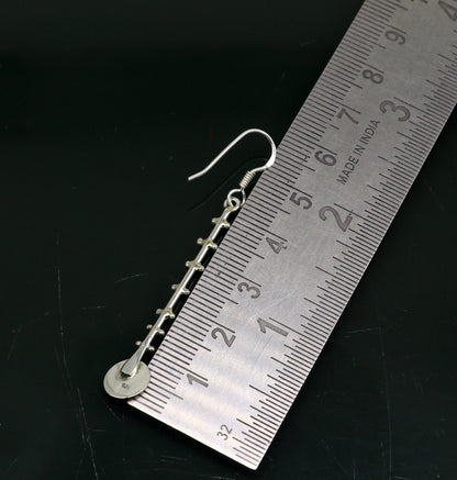 Solid 925 sterling silver handmade drop dangle hoop earring by TRIBAL ORNAMENTS, featuring stamped design and fashionable jewelry style.