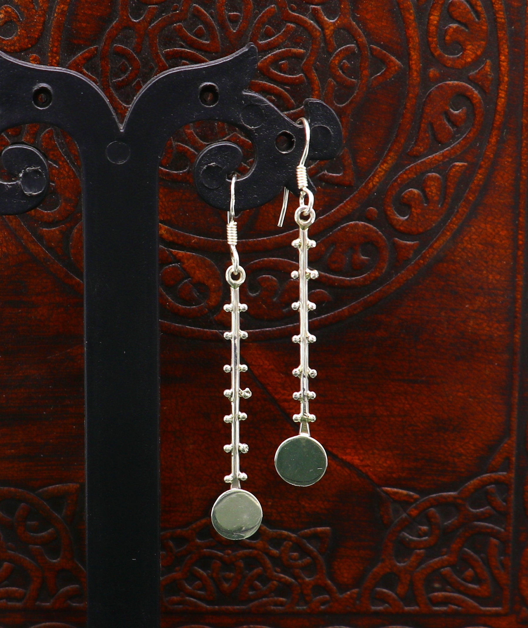 Solid 925 sterling silver handmade drop dangle hoop earring by TRIBAL ORNAMENTS, featuring stamped design and fashionable style.